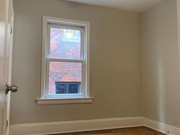 Bedroom 1 with closet. Ceiling fan, new windows.