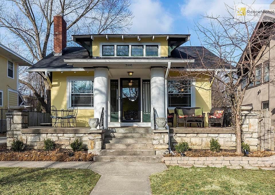 Great Curb Appeal on this Brookside Bungalow! Charming Porch and Easy Going Landscaping!