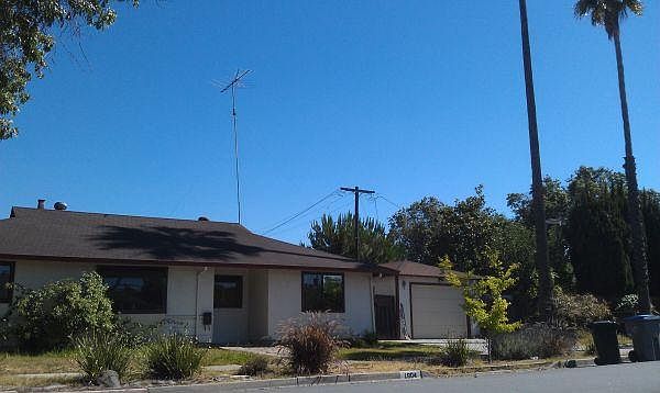 Exterior view with detached 1 car garage