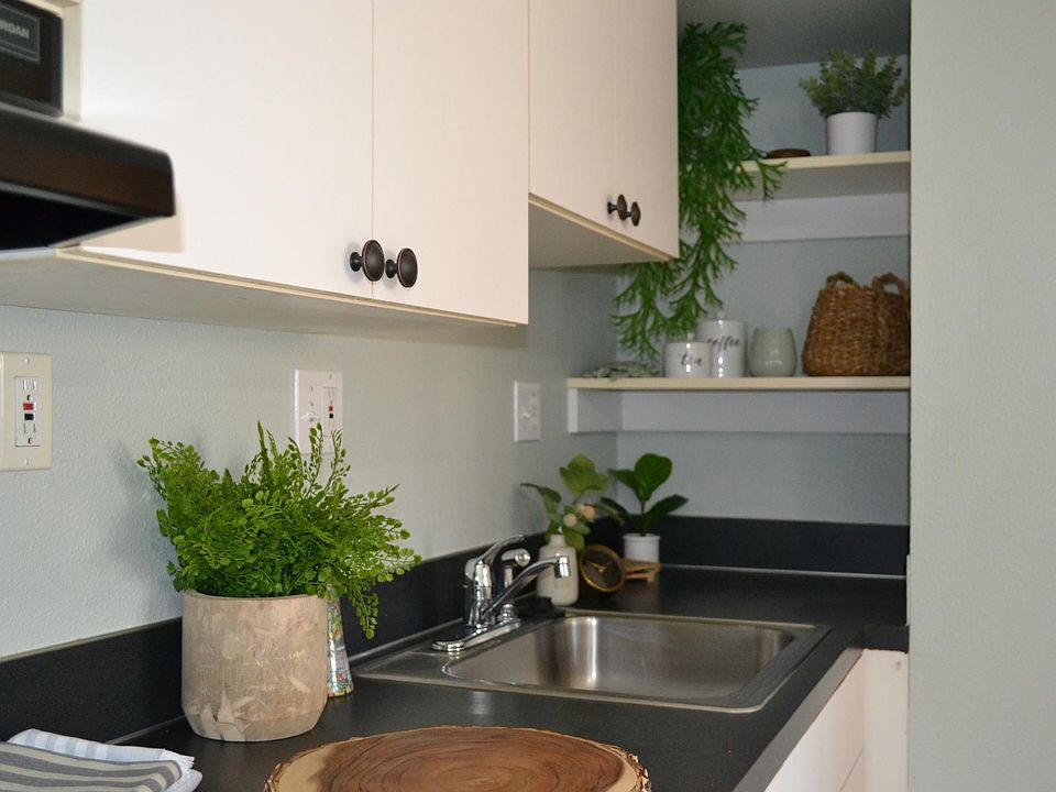 White kitchen with solid surface counters