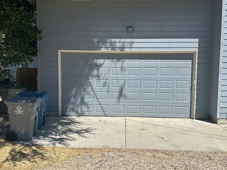 Entrance to the 2 car garage is in the back ally