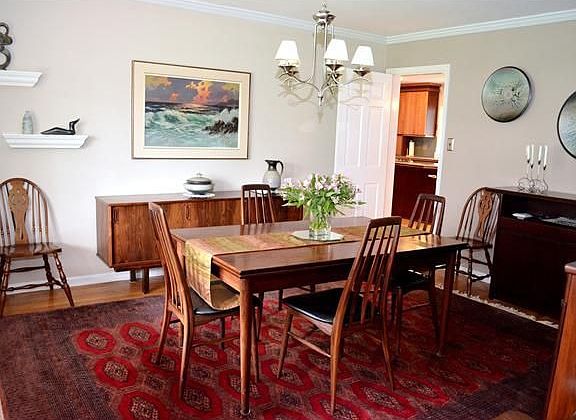 Formal dining room with crown molding