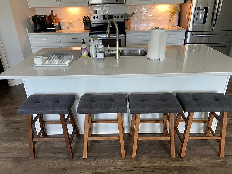 Four barstools at kitchen island
