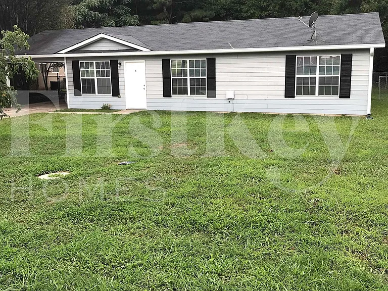 117 Whispering Pine Ln NE — Photo 1