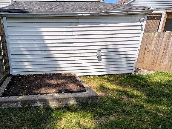 Raised garden bed ready for planting your favorite vegetables or flowers_ideal for anyone with a green thumb.