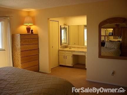 Master Bedroom
						:
						In the alcove, there is a double sink and private bath.
