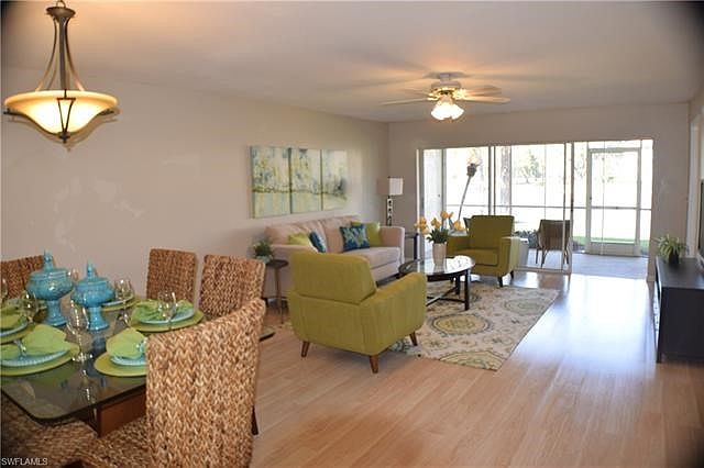 Open floor plan with new laminate flooring making for a light and bright home