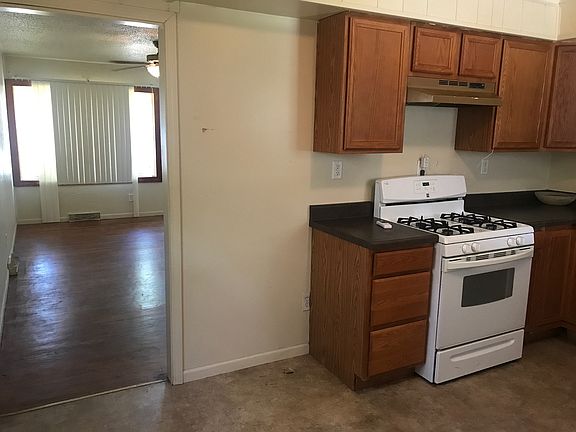 Kitchen and view of family room