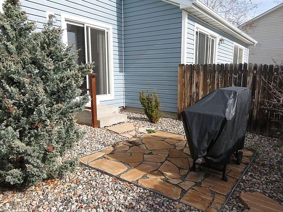 Fenced backyard with access to open space and trails