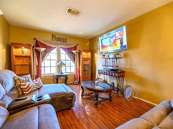 Enjoy time with family and friends in the front living space.