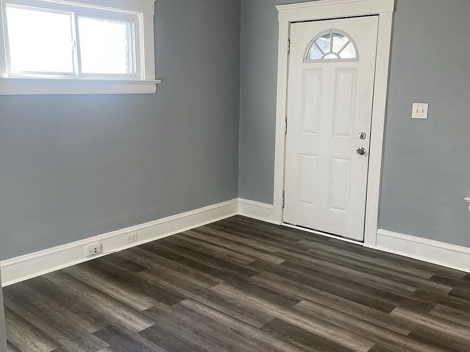 Living Room (Front Porch for unit beyond the door)