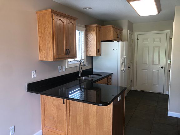 Recently remodeled kitchen with granite countertops