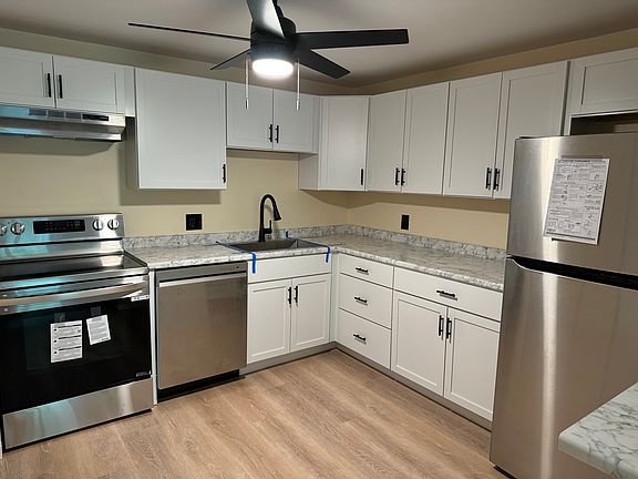 Beautiful kitchen, all new counters, flooring, cabinets, ceiling fan, lots of storage