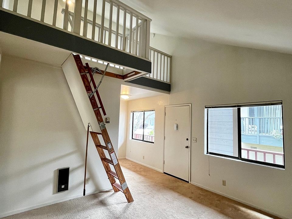 Living Room. Loft ladder folds up when not in use.