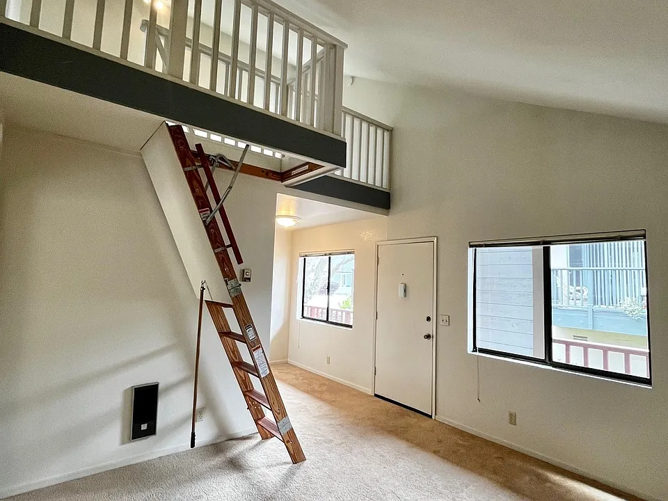Living Room. Loft ladder folds up when not in use.
