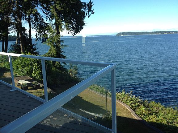 Trex deck off living room for patio dining over water