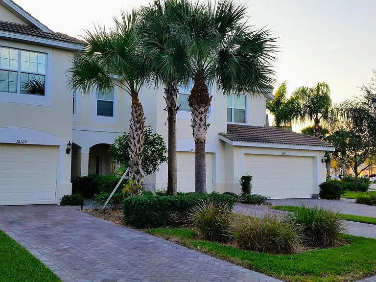 Front exterior, attached garage, extra long driveway