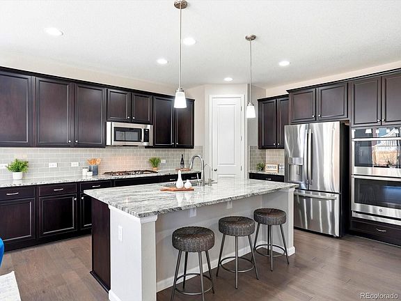 4th image of 6695 Petunia Place