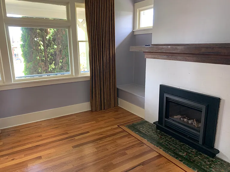 Living room with North Facing Windows to covered front porch
