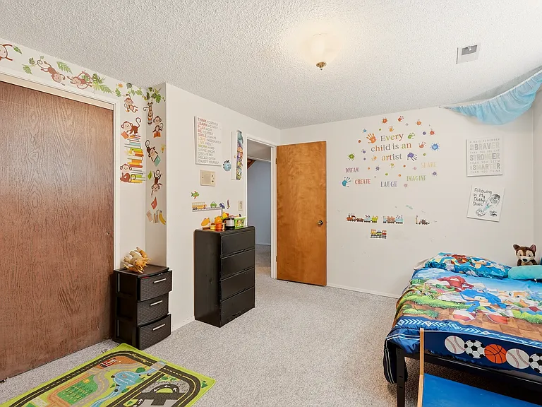 lower-level second bedroom is larger than most other homes