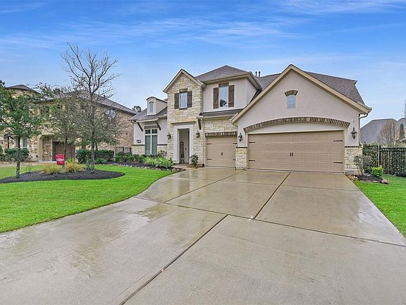 Wide driveway and 3 car garage!