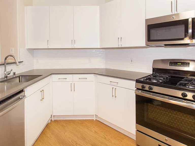 Phase 1 Kitchen with Stainless Steel Appliances and Granite Countertops