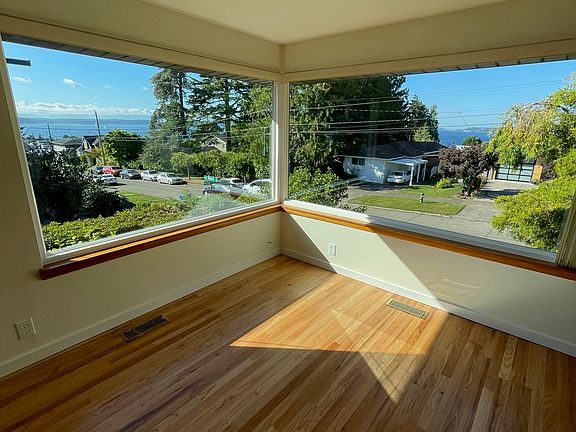 Living room views of Olympics and Magnolia