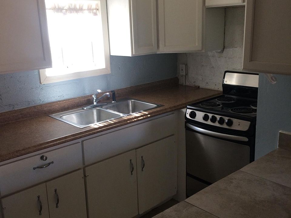 kitchen with window overlooking back yard