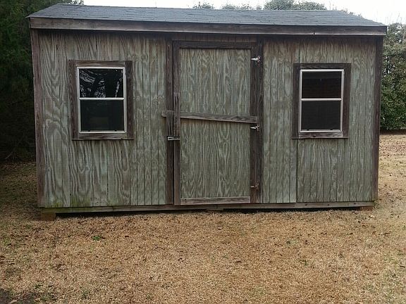 storage barn behind house