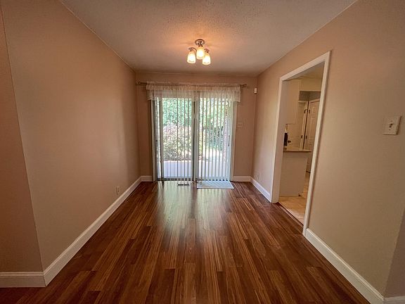 Dining area with slide door to back patio.