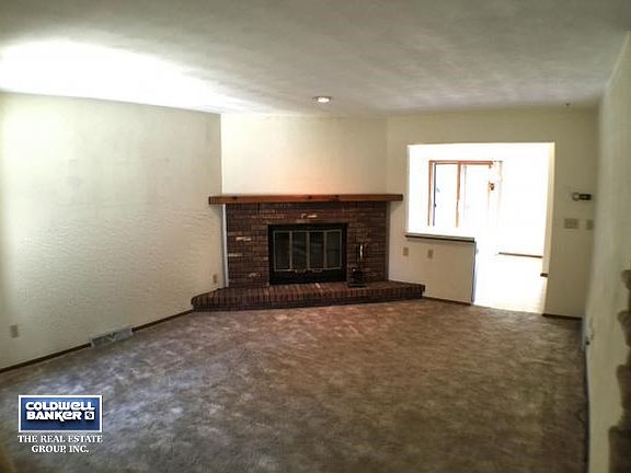 Living room with wood FP