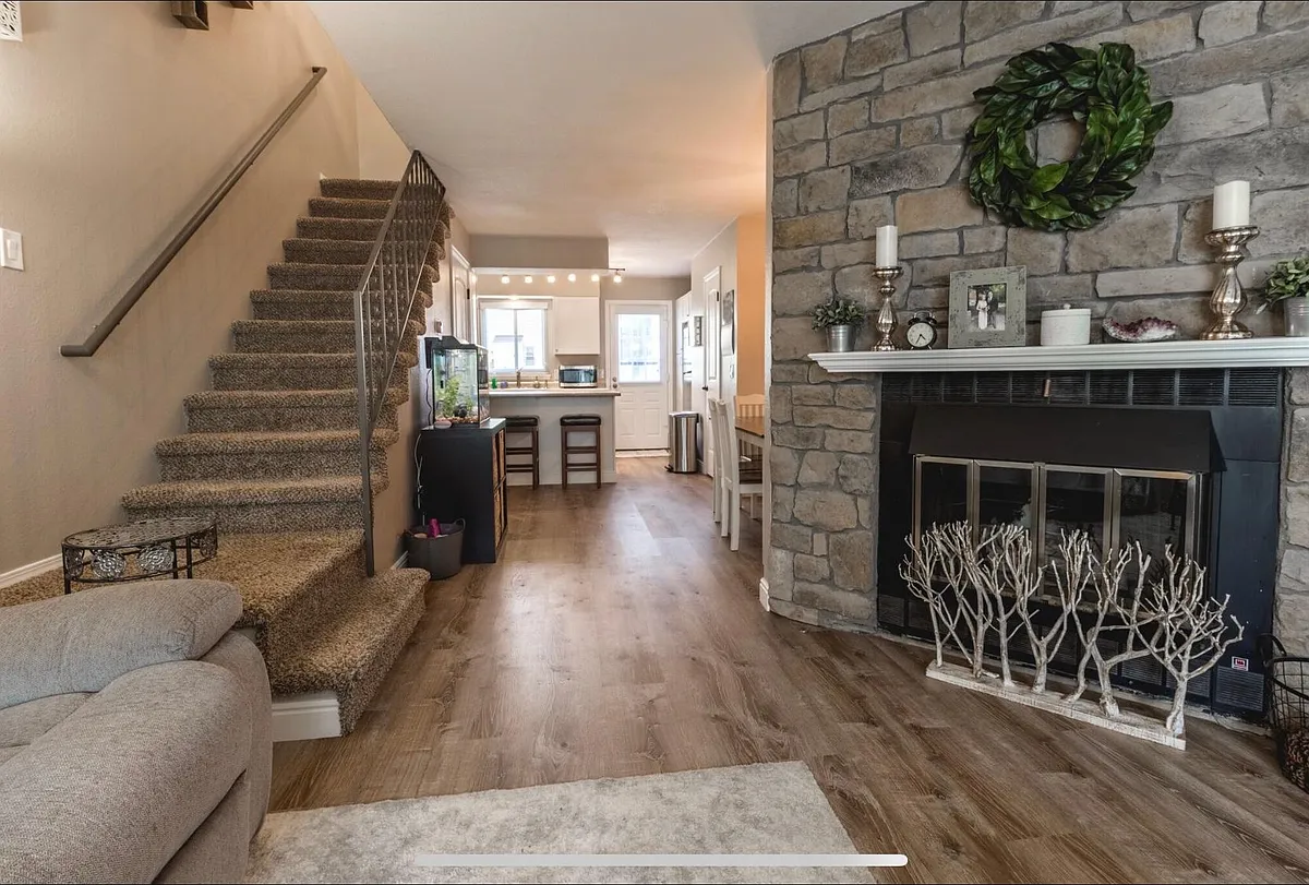 Living room on main level. - 3145 S Estes St
