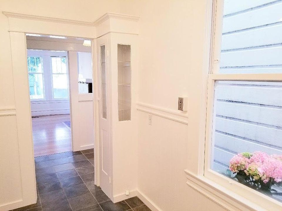 View to front room from kitchen.