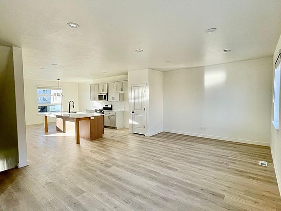 White oak floors and open floor plan.