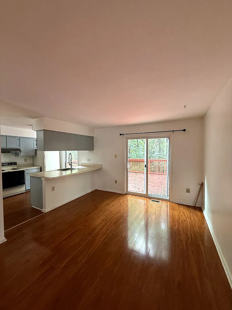 Spacious 3-Bedroom Townhome in Wellington Valley | Finished Basement & Wooded Views — Photo 4
