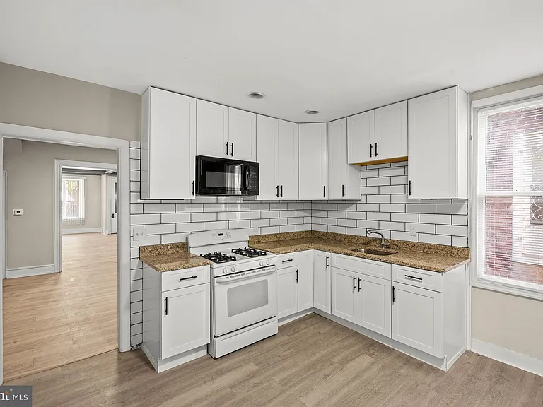 5011 Larchwood Ave — Photo 8