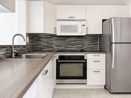 10865 SW 112th Ave #203 Photo 1