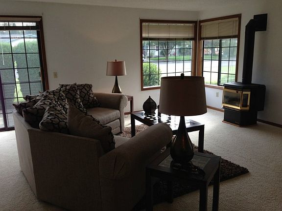 Great Room with cozy fireplace and a nice patio for relaxing and dining