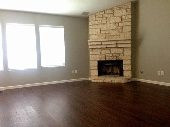 Wood burning fireplace with gas starter