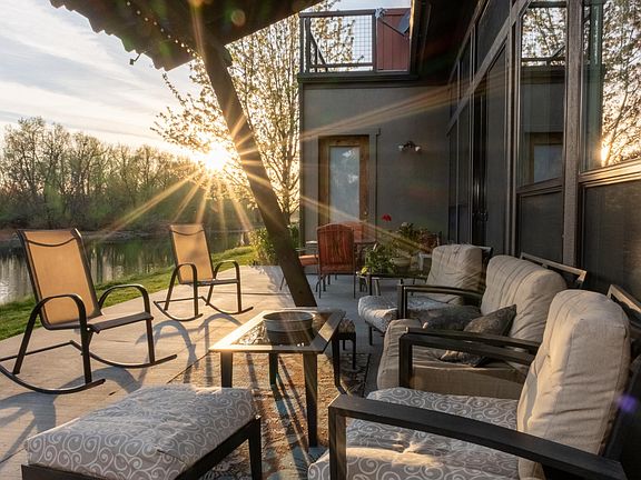 Patio at sunset, overlooking lake.