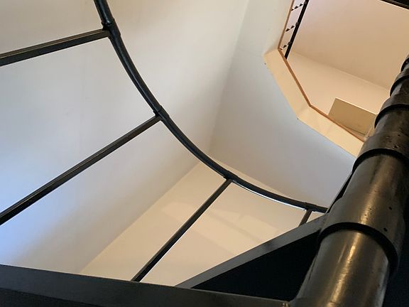 Private entry on 2nd floor leads to spiral stairs and entry to living room