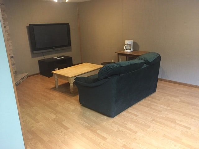 living area, TV & Sofa furnished