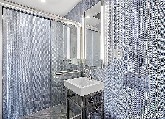 5th image of 221 E 10th St APT 13