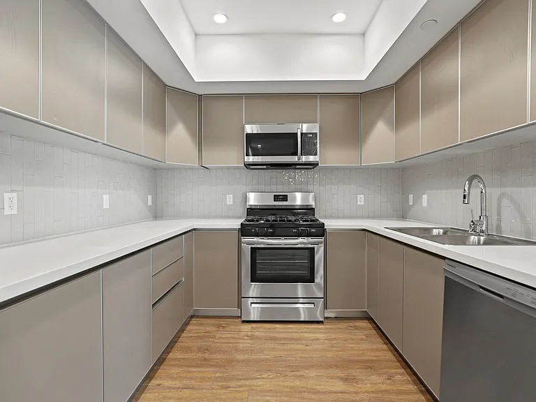 Full-Size Kitchen with Energy-Efficient Appliances and Ample Cabinet Storage