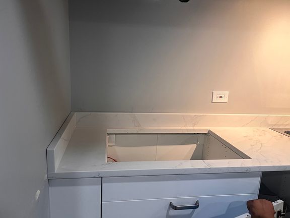 new kitchen complete with stainless steel appliances