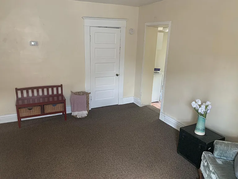 Livingroom. View towards kitchen