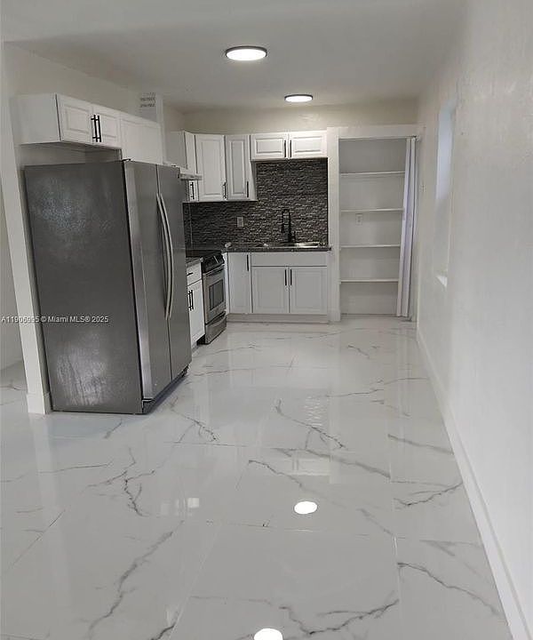 1st image of 560 NW 188th St