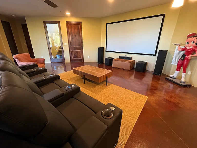 Lower Media Room with Hallway on the Left to Lower Powder Room and Master Suite 4