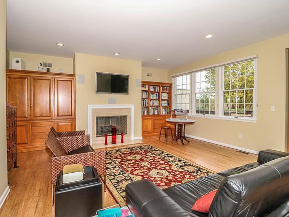 LIVING ROOM WITH BUILT-IN CABINETRY