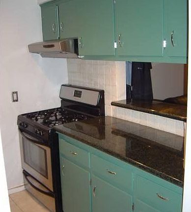 Kitchen with gas stove.
